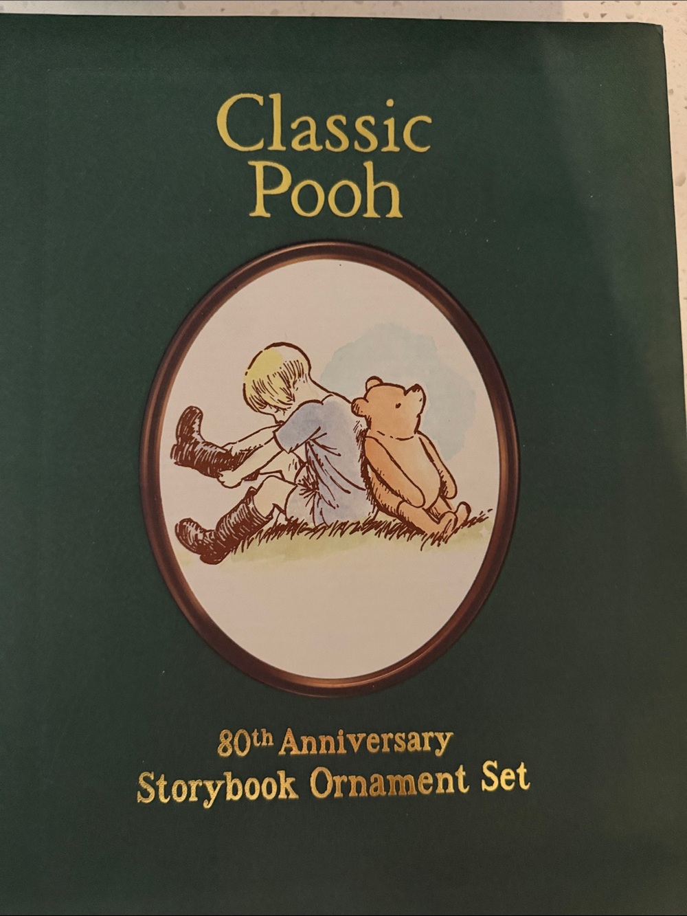 Disney Classic Pooh 80th Anniversary Storybook Ornament set.